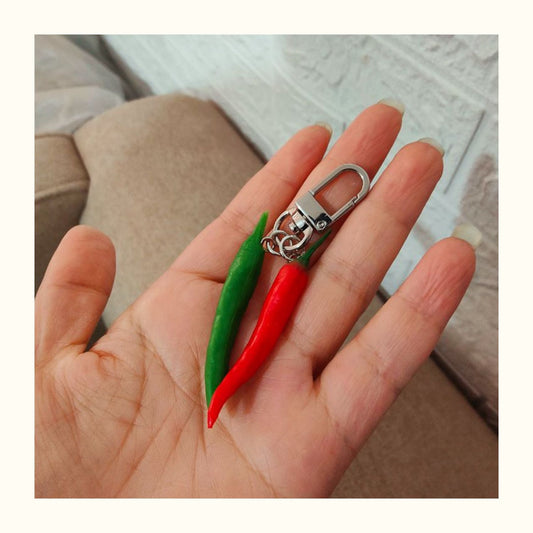 Little Tan Original - Ultra-Realistic Chilli Keychain on hand