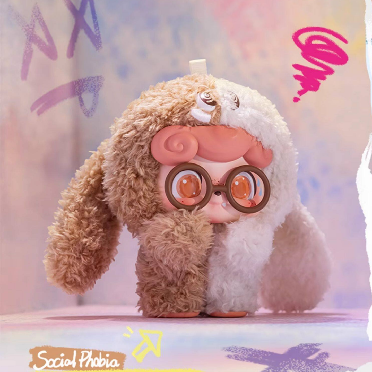 Two-tone fluffy “Social Phobia” plush Q kid with oversized round glasses and shy expression – a soft, relatable little companion to clip onto your bag for everyday comfort.
