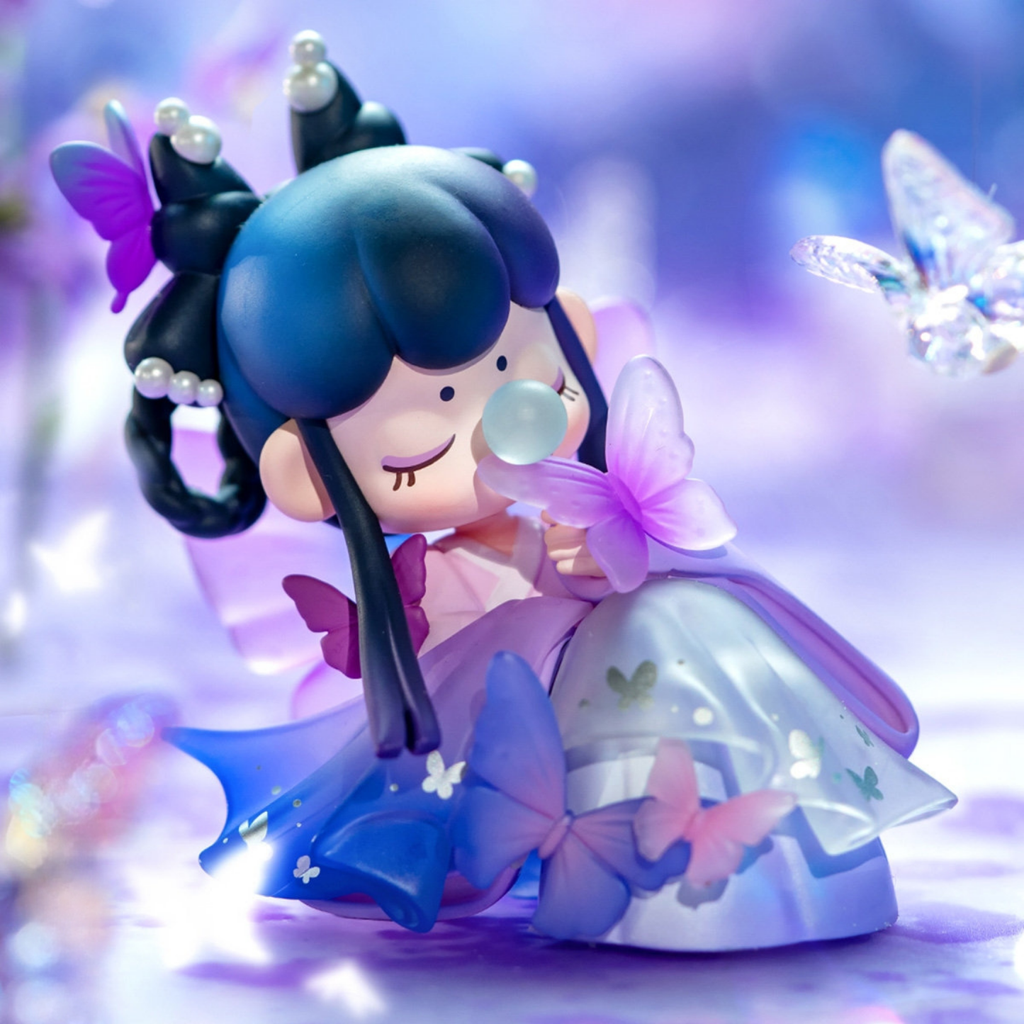 Butterfly Lingering Nanci figure, cute girl with dark blue hair, pearl accessories and purple butterflies, dreamy pastel scene.