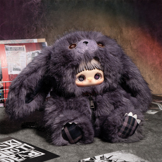 Cute and exquisite MAYMEI Plush Backpack Toy is in dark gray, with adorable expression. Its name is Independent, encouraging people to follow their own hearts and be brave to be themselves. It can be used as a bag charm or a backpack.