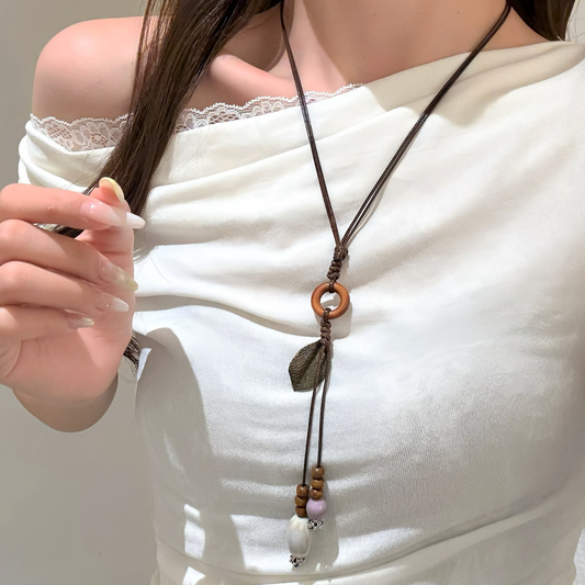 Peach Tea - Sophora Leaf Ceramic Long Pendant Necklace. A wooden ring and leaf pendant