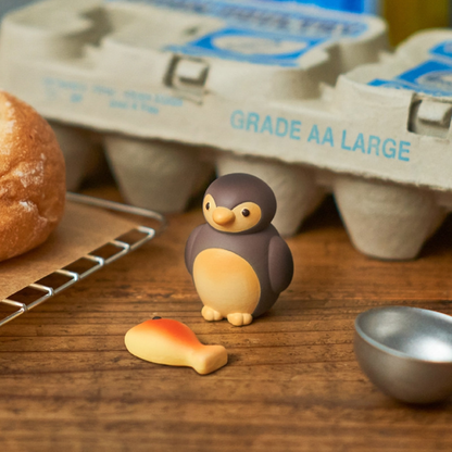 Cute chocolate penguin bread with a cute small fish.