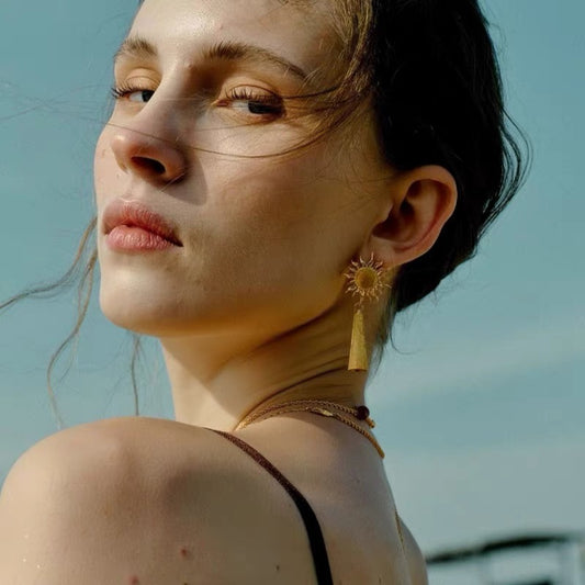 Priceford - Sunburst Tassel Earrings gold on model