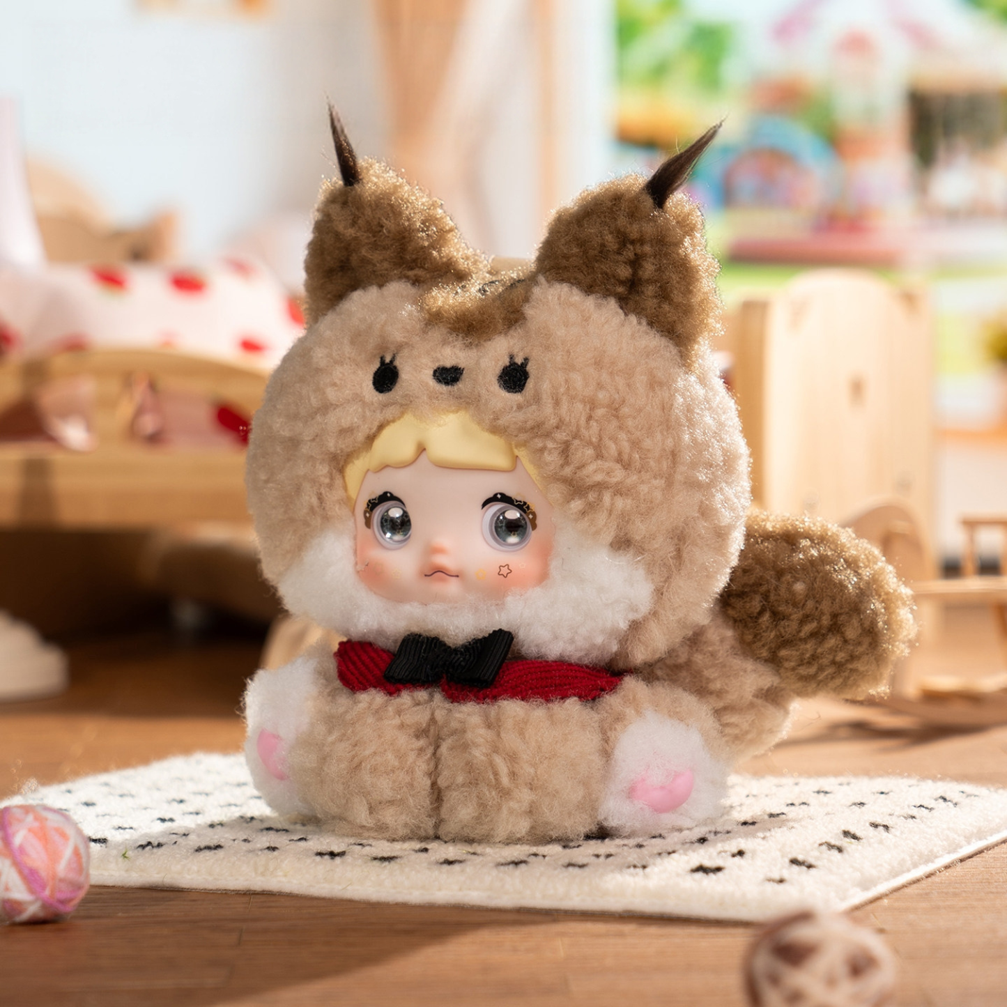 Cute Squirrel Nommi is in brown colour, with bright eyes. It can be used as a bag charm.
